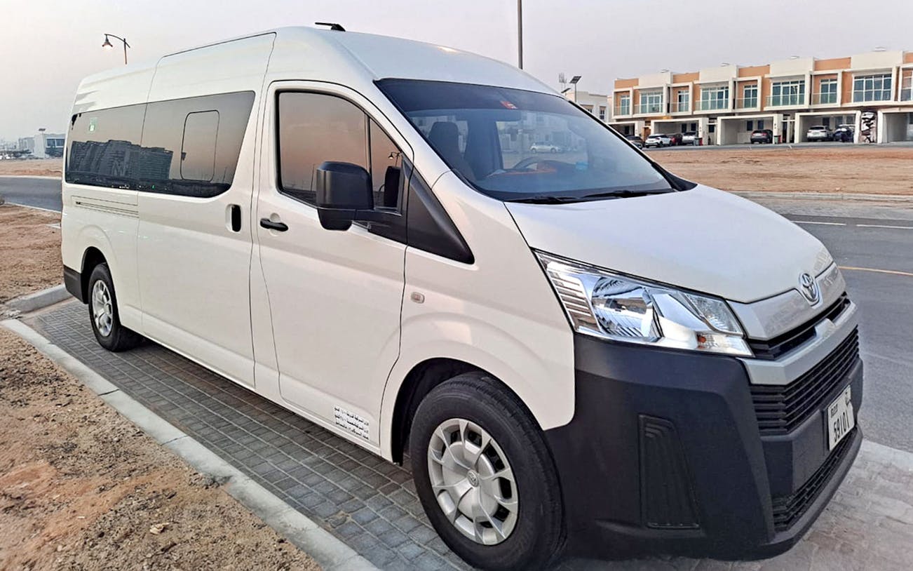 Shuttle bus parked near Global Village, Dubai.