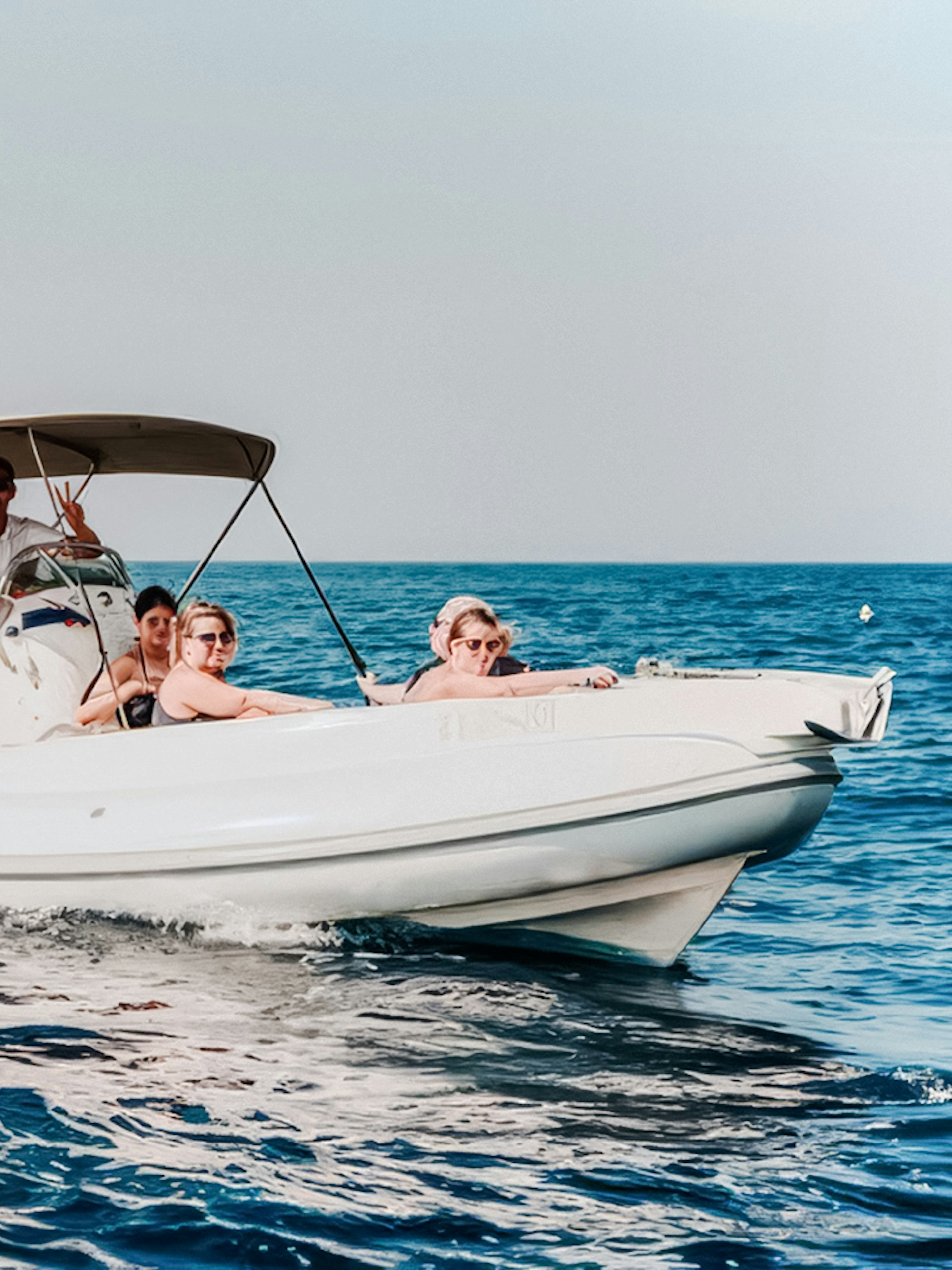 Speedboat with tourists on Blue Lagoon, Solta & Trogir tour.