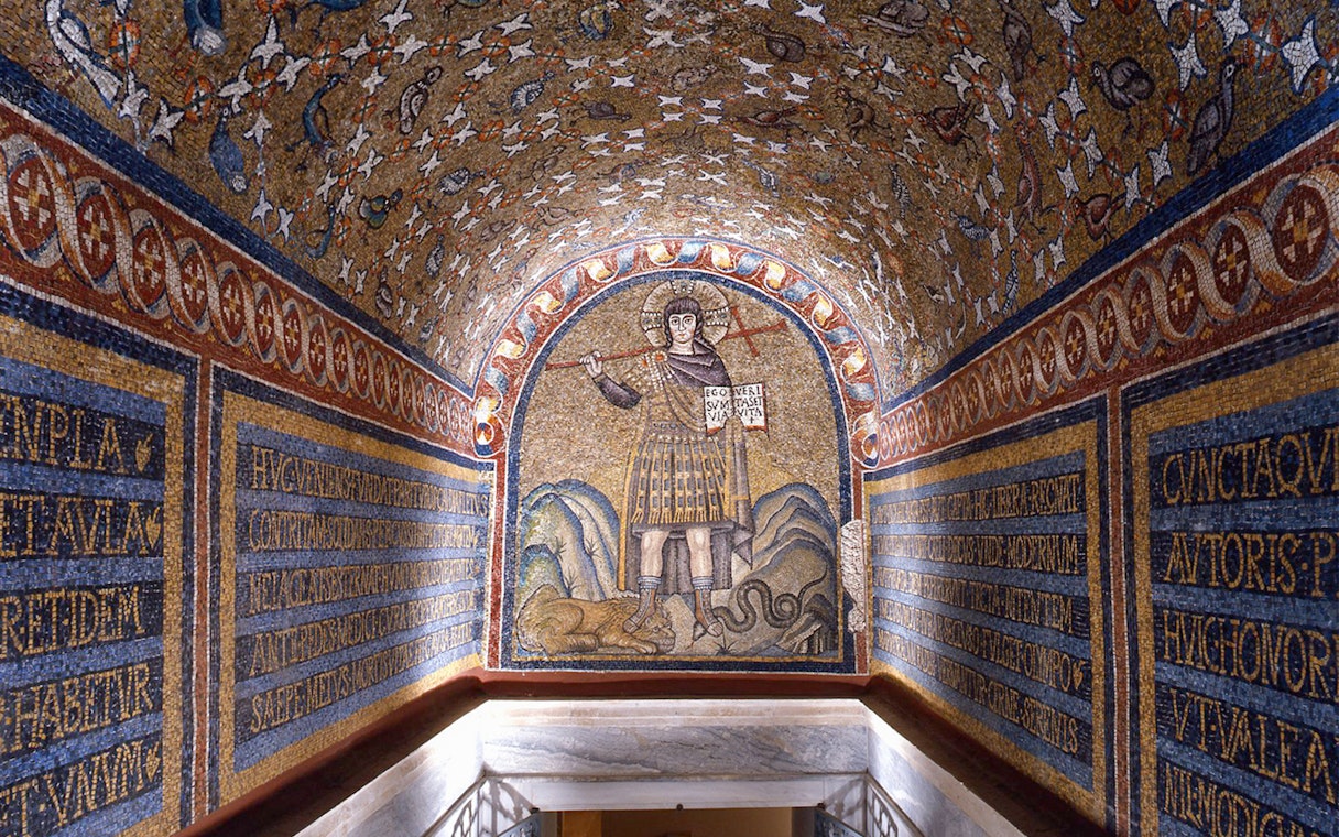 Mosaic of St. Andrew in Archiepiscopal Museum, Ravenna, depicting a saint with a cross and scroll.