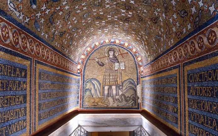 Mosaic of St. Andrew in Archiepiscopal Museum, Ravenna, depicting a saint with a cross and scroll.