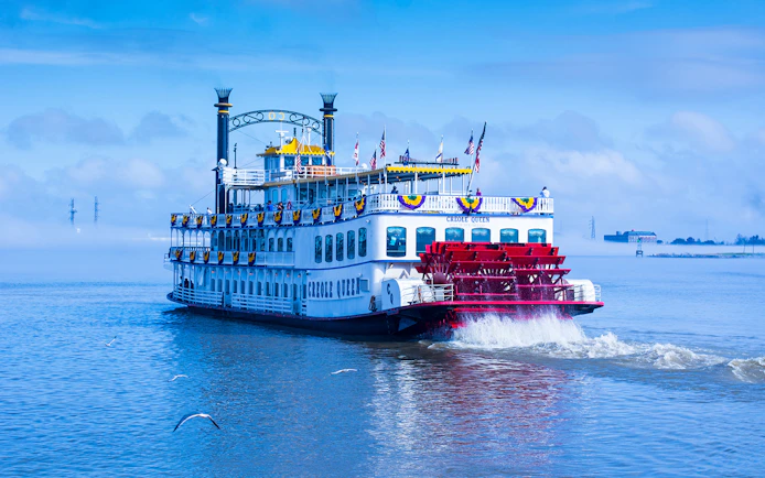 Paddle steamboat on the Mississippi River in New Orleans, part of Go City attractions.