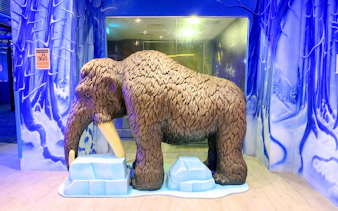 Woolly mammoth sculpture at Amazonia Singapore indoor playground.