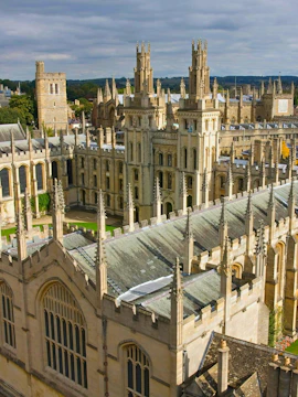 Oxford University architecture with spires and historic buildings on a walking tour.