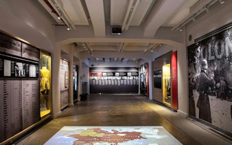 Jewish museum exhibit in Buenos Aires showcasing historical artifacts and photographs.