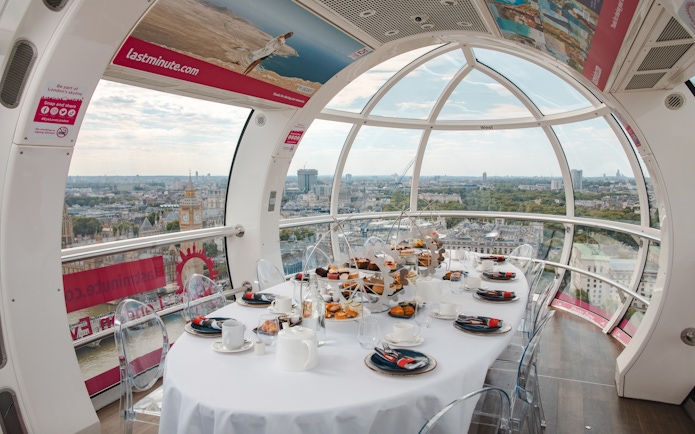 London Eye capsule set for afternoon tea with city view.
