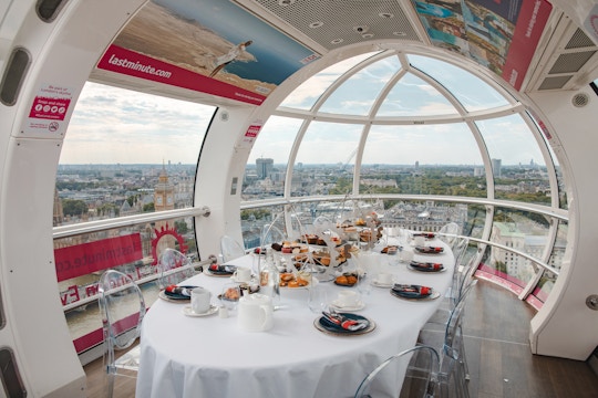 London Eye capsule set for afternoon tea with city view.