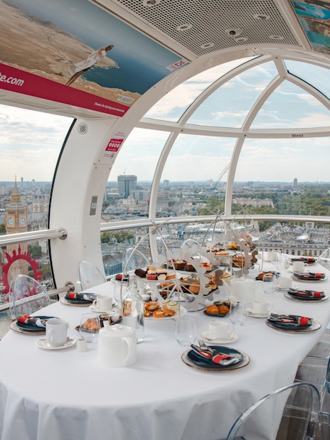 London Eye capsule set for afternoon tea with city view.