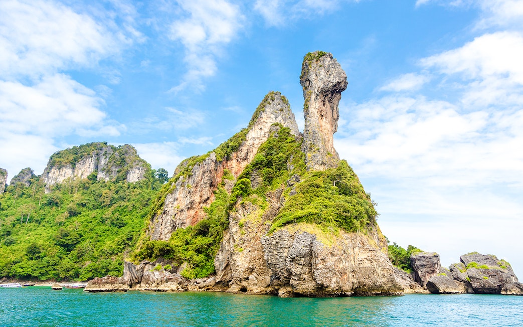 Chicken Island's unique rock formation in Krabi, Thailand, surrounded by turquoise waters.