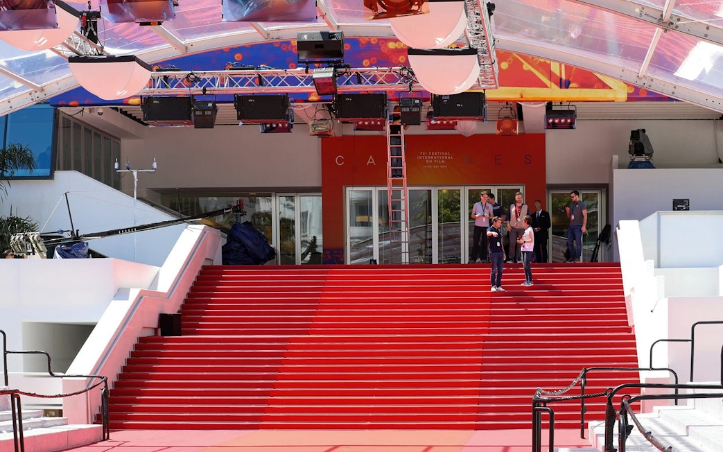 Red carpet entrance at Cannes Film Festival venue, part of the Nice to Cannes guided tour.