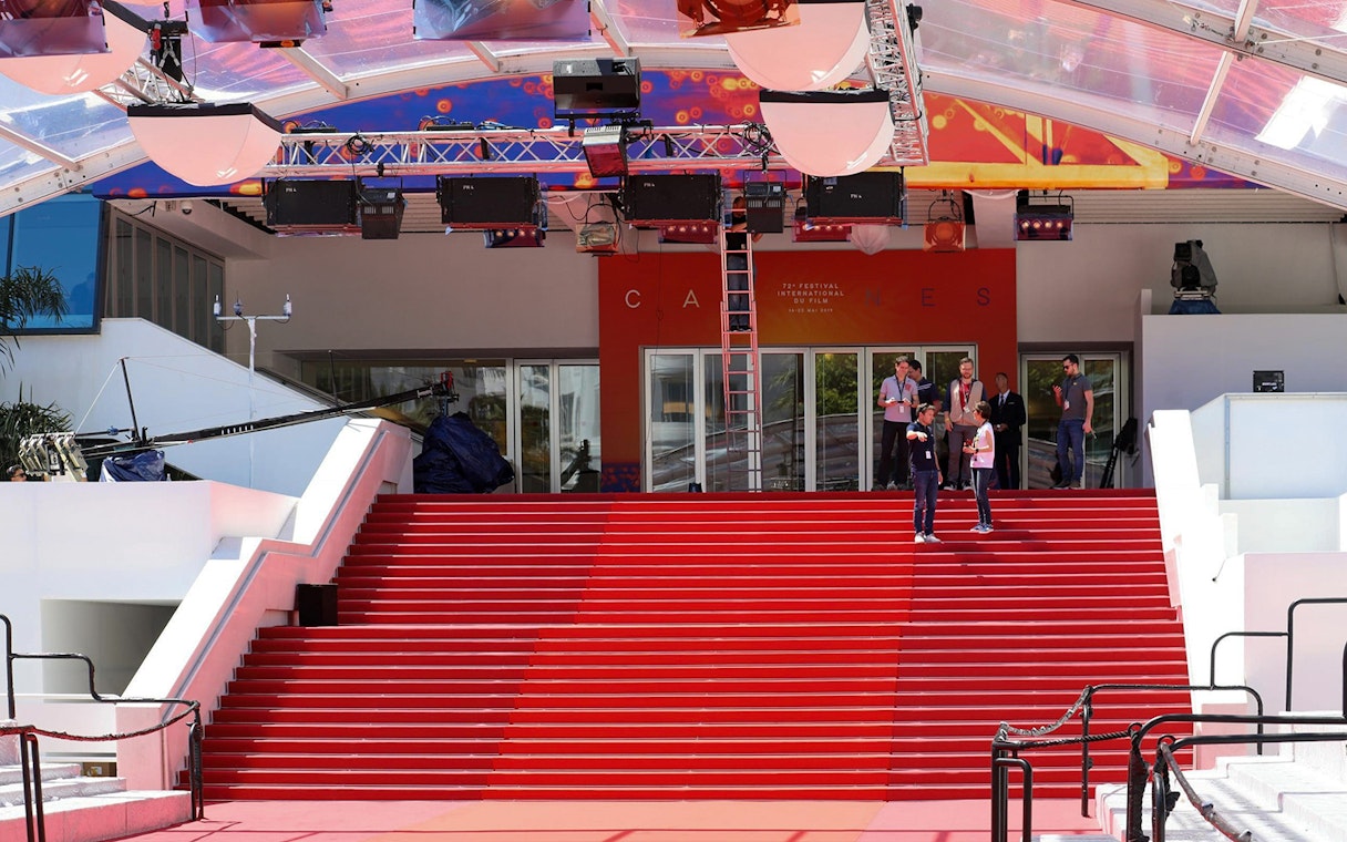 Red carpet entrance at Cannes Film Festival venue, part of the Nice to Cannes guided tour.