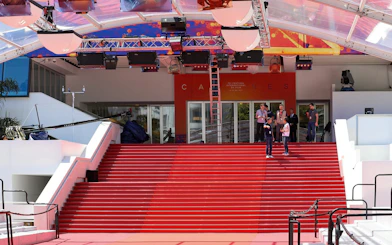 Red carpet entrance at Cannes Film Festival venue, part of the Nice to Cannes guided tour.