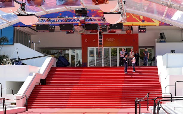 Red carpet entrance at Cannes Film Festival venue, part of the Nice to Cannes guided tour.