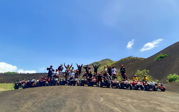Group on ATVs at Kintamani with Mount Batur in the background.