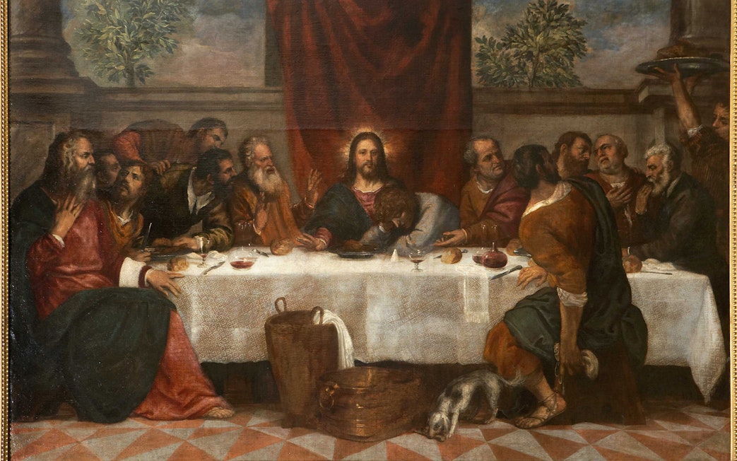 The Last Supper by Titian depicting Jesus and disciples at a table with bread and wine.