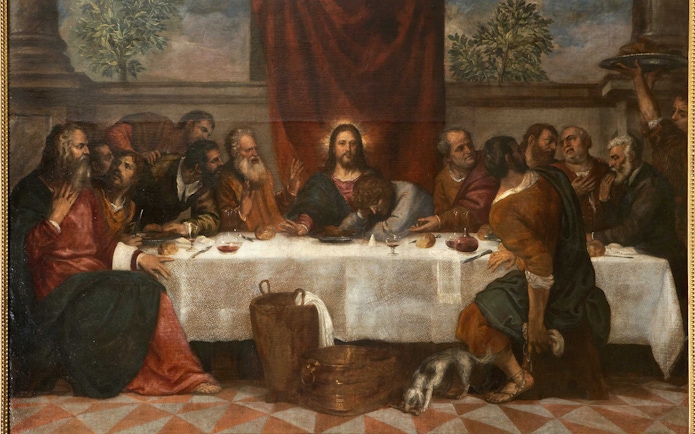 The Last Supper by Titian depicting Jesus and disciples at a table with bread and wine.