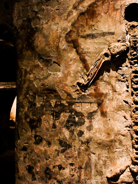 Visitors viewing skeletal remains in the Catacombs of San Gaudioso, Naples, Italy.