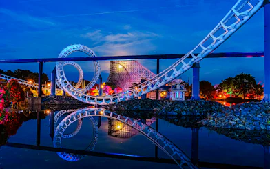 Roller coaster loop at night during Halloween at Heide Park, Germany.
