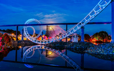 Roller coaster loop at night during Halloween at Heide Park, Germany.