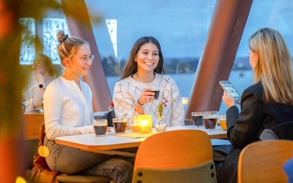 Guests enjoying drinks on a dinner cruise from Stavanger.
