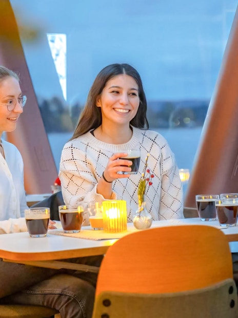 Guests enjoying drinks on a dinner cruise from Stavanger.