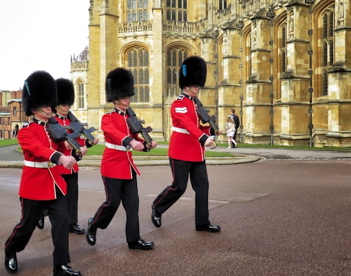 Guards marching at Windsor Castle during a half-day trip from London.