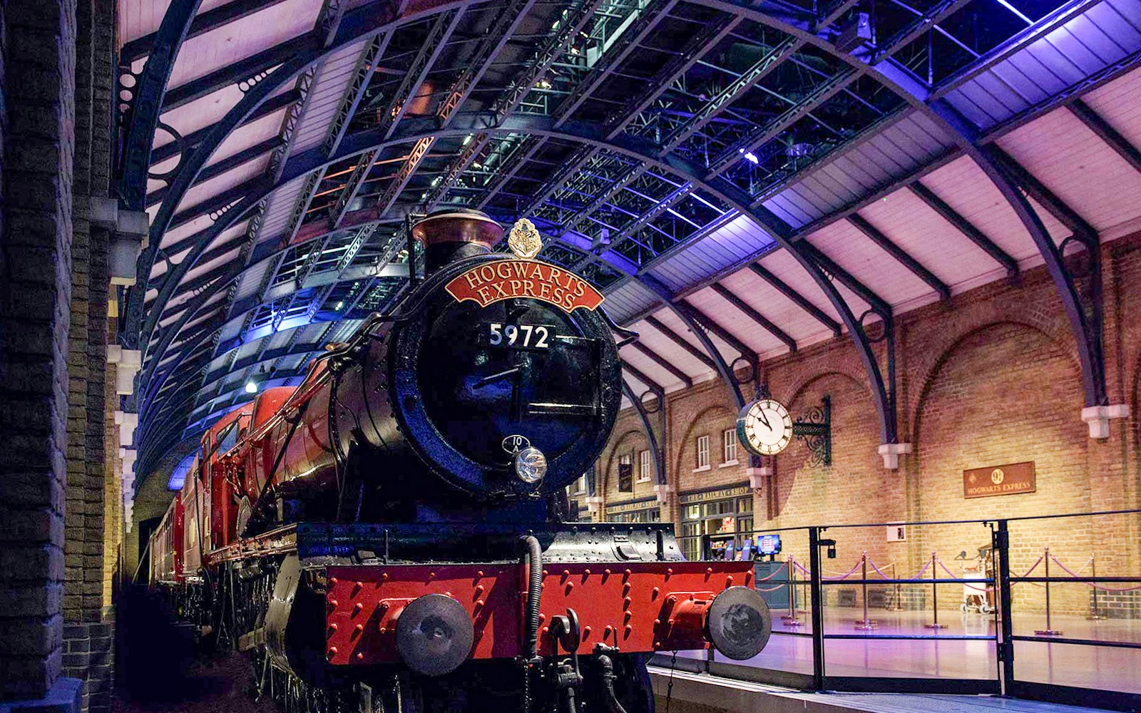 Hogwarts Express train on platform at Harry Potter London tour.