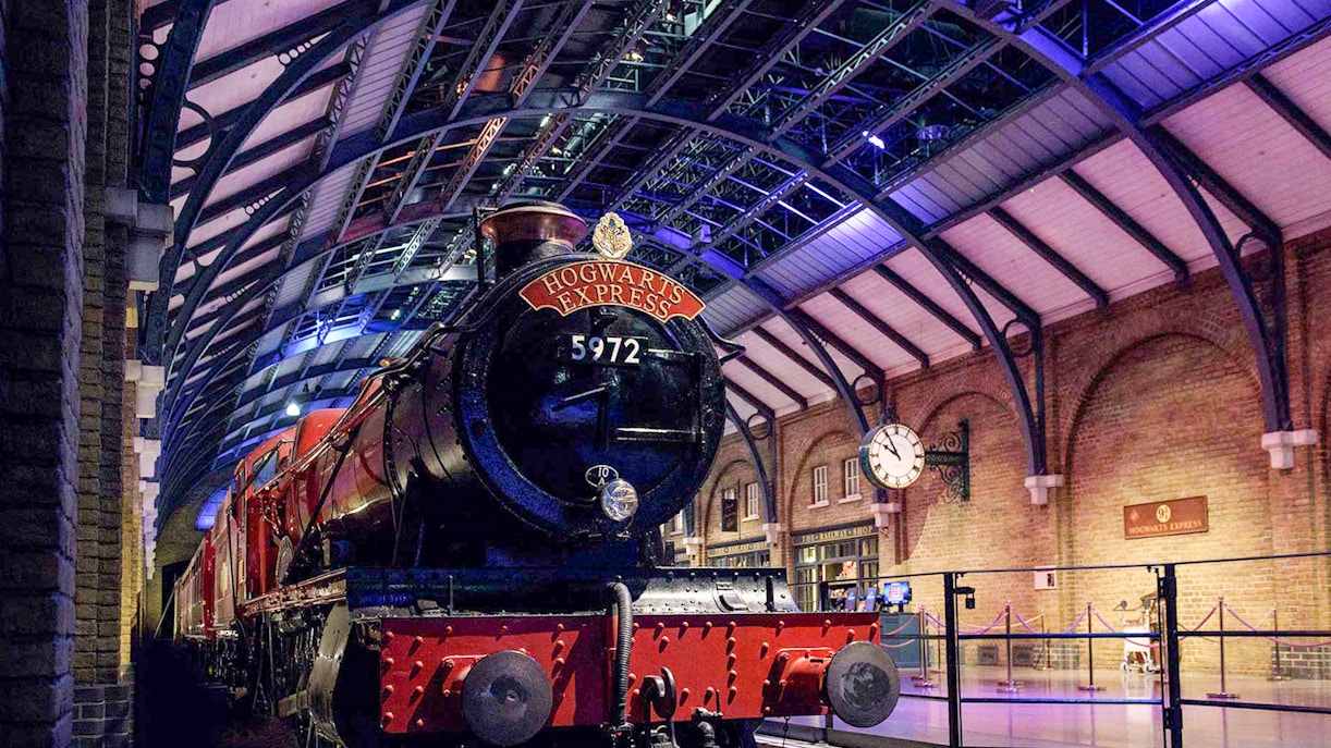 Hogwarts Express train on platform at Harry Potter London tour.