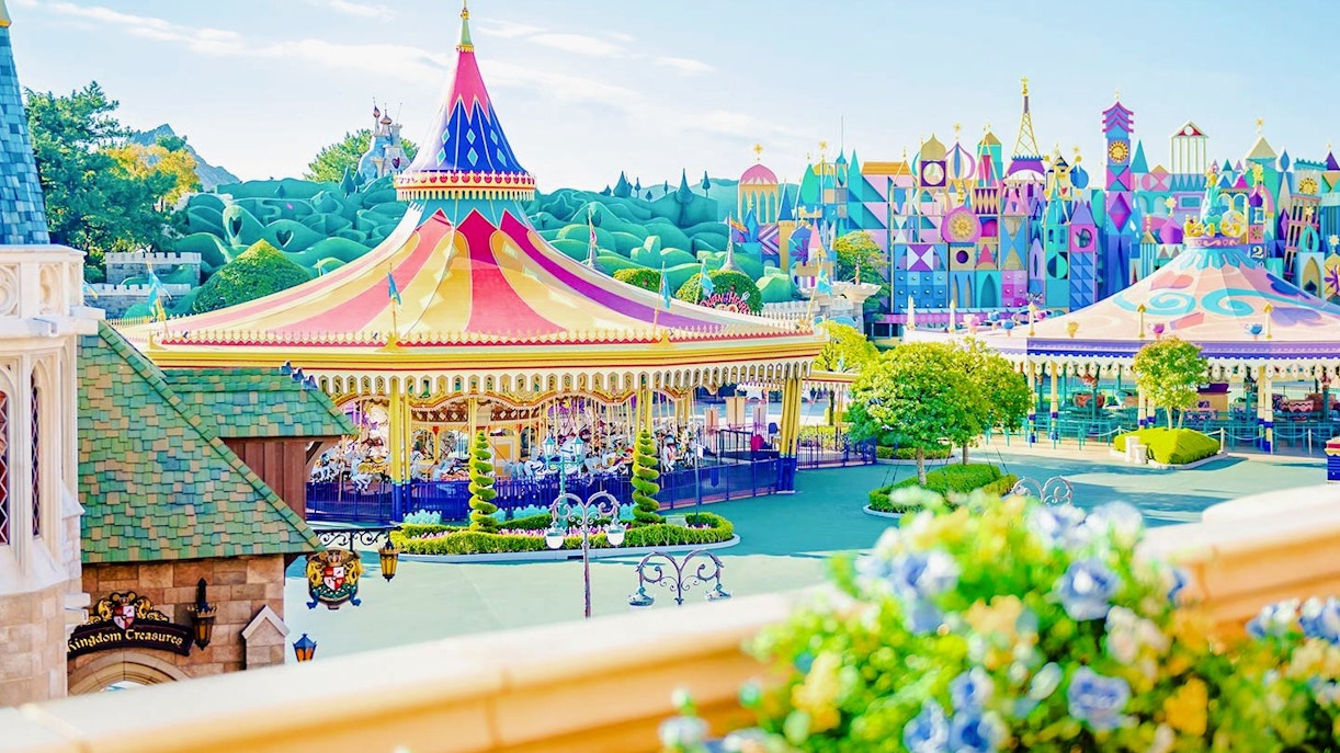 Colourful carousel and attractions at Tokyo Disneyland.