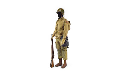 WWII soldier uniform with rifle, part of Musée de l'Armée exhibit, Paris.