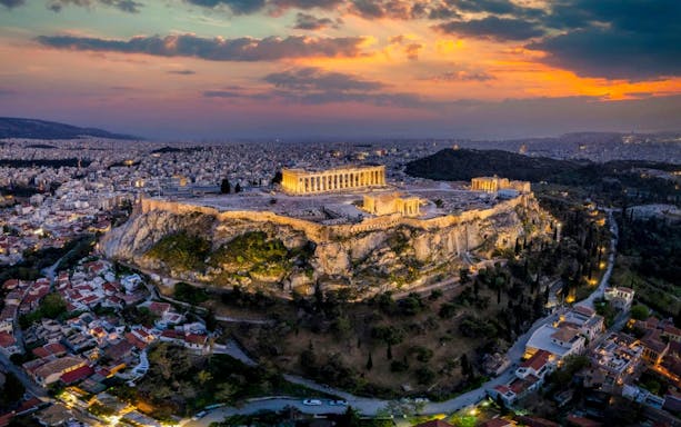 Acropolis and Parthenon at sunset, Athens skyline view.