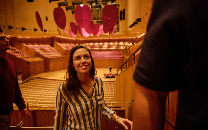 Visitors touring the interior of the Sydney Opera House.