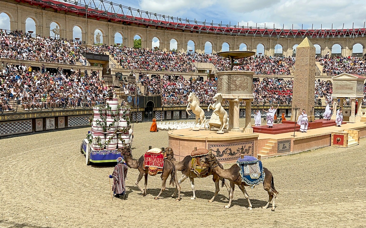 Camels in a Roman-themed arena show at Puy du Fou Theme Park.