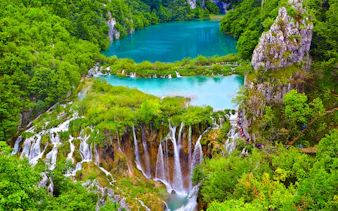 Waterfalls and turquoise lakes at Plitvice Lakes National Park, Croatia.
