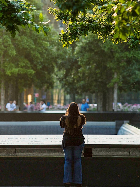 Women observing the 9/11 Memorial in New York City.