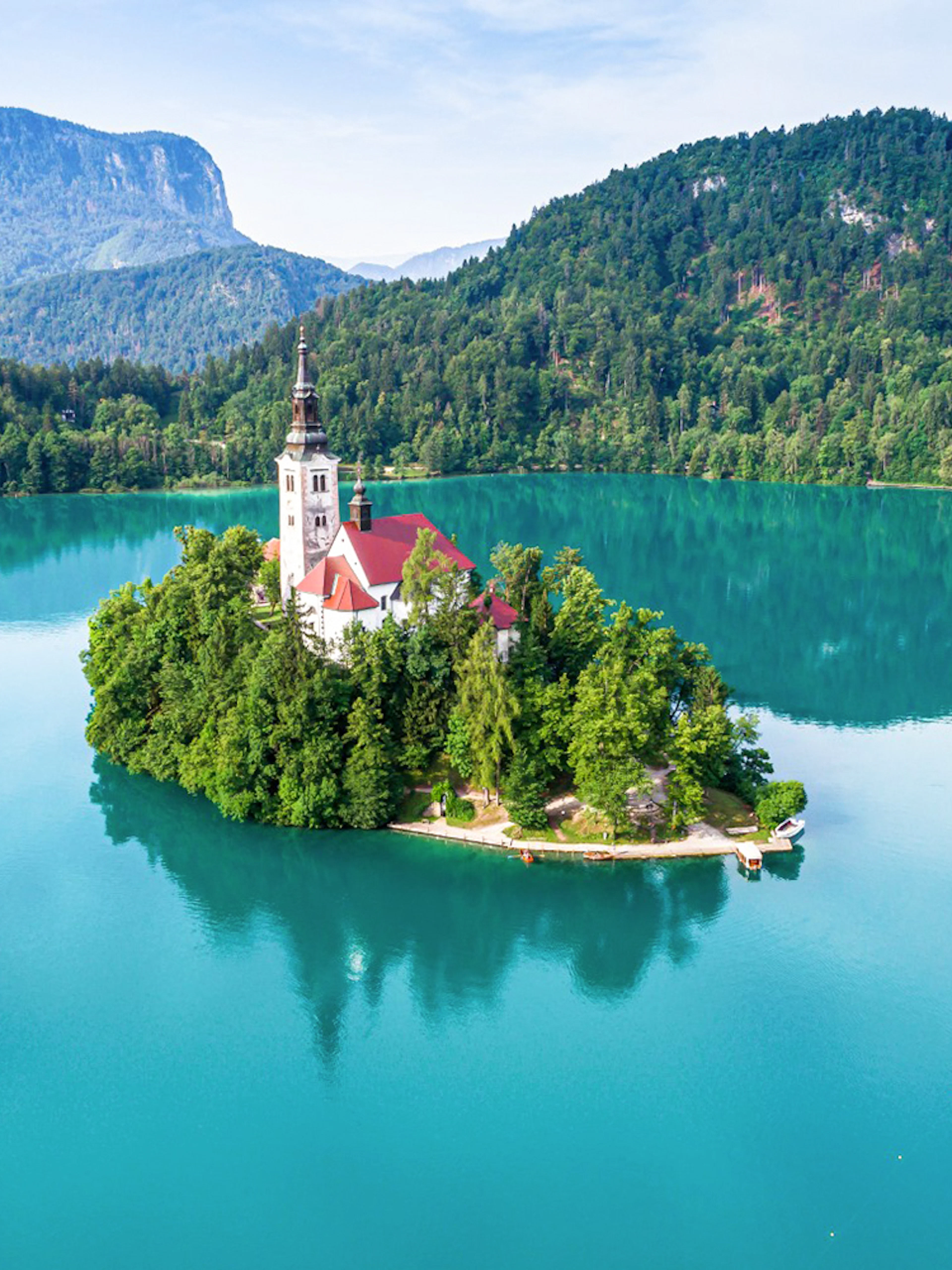 Bled Castle overlooking Lake Bled with island church, Slovenia.