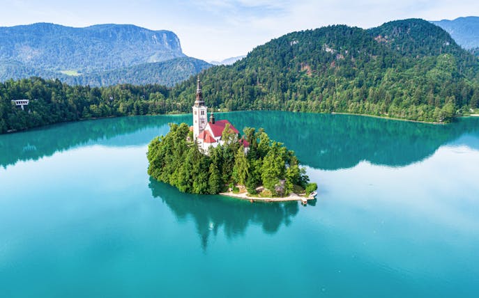Bled Castle overlooking Lake Bled with island church, Slovenia.