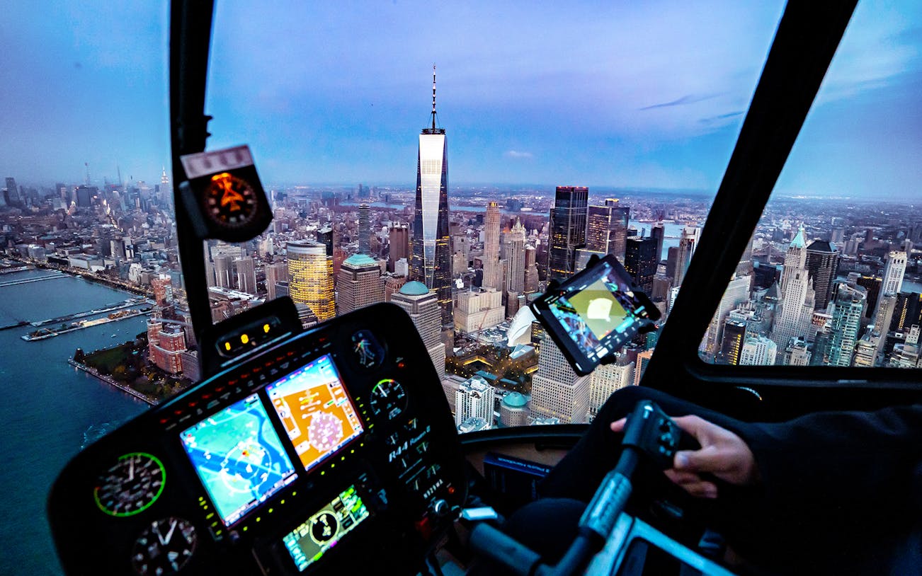 Helicopter cockpit view of New York City skyline during private tour from Westchester.
