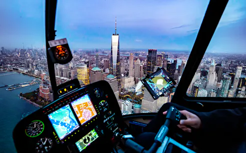 Helicopter cockpit view of New York City skyline during private tour from Westchester.