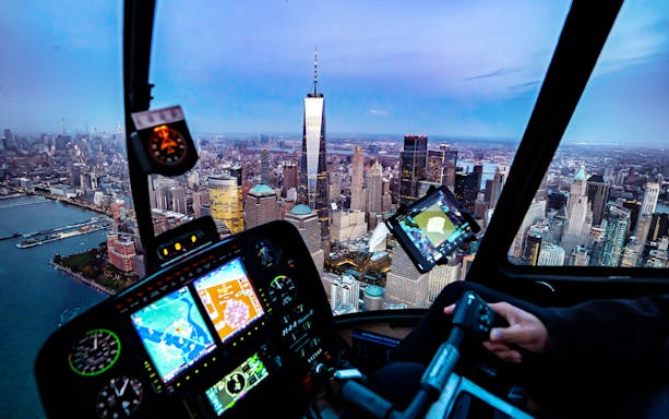 Helicopter cockpit view of New York City skyline during private tour from Westchester.