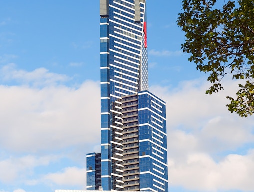 Eureka Skydeck in Melbourne, Australia, towering against a blue sky.