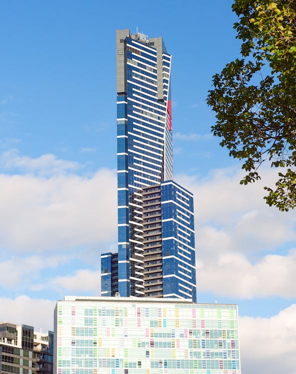 Eureka Skydeck in Melbourne, Australia, towering against a blue sky.