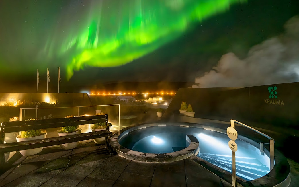 Krauma Geothermal Baths with Northern Lights in Iceland.