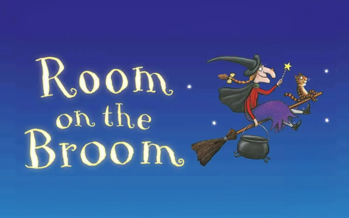 Witch and cat flying on broomstick, "Room on the Broom" text.