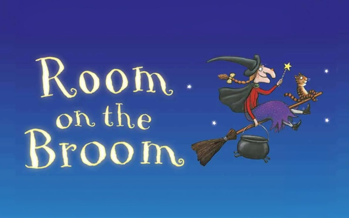 Witch and cat flying on broomstick, "Room on the Broom" text.
