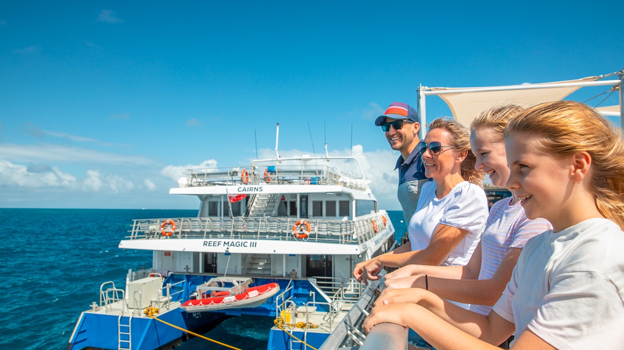 Tourists on a pontoon during a full-day cruise from Cairns to the Great Barrier Reef.