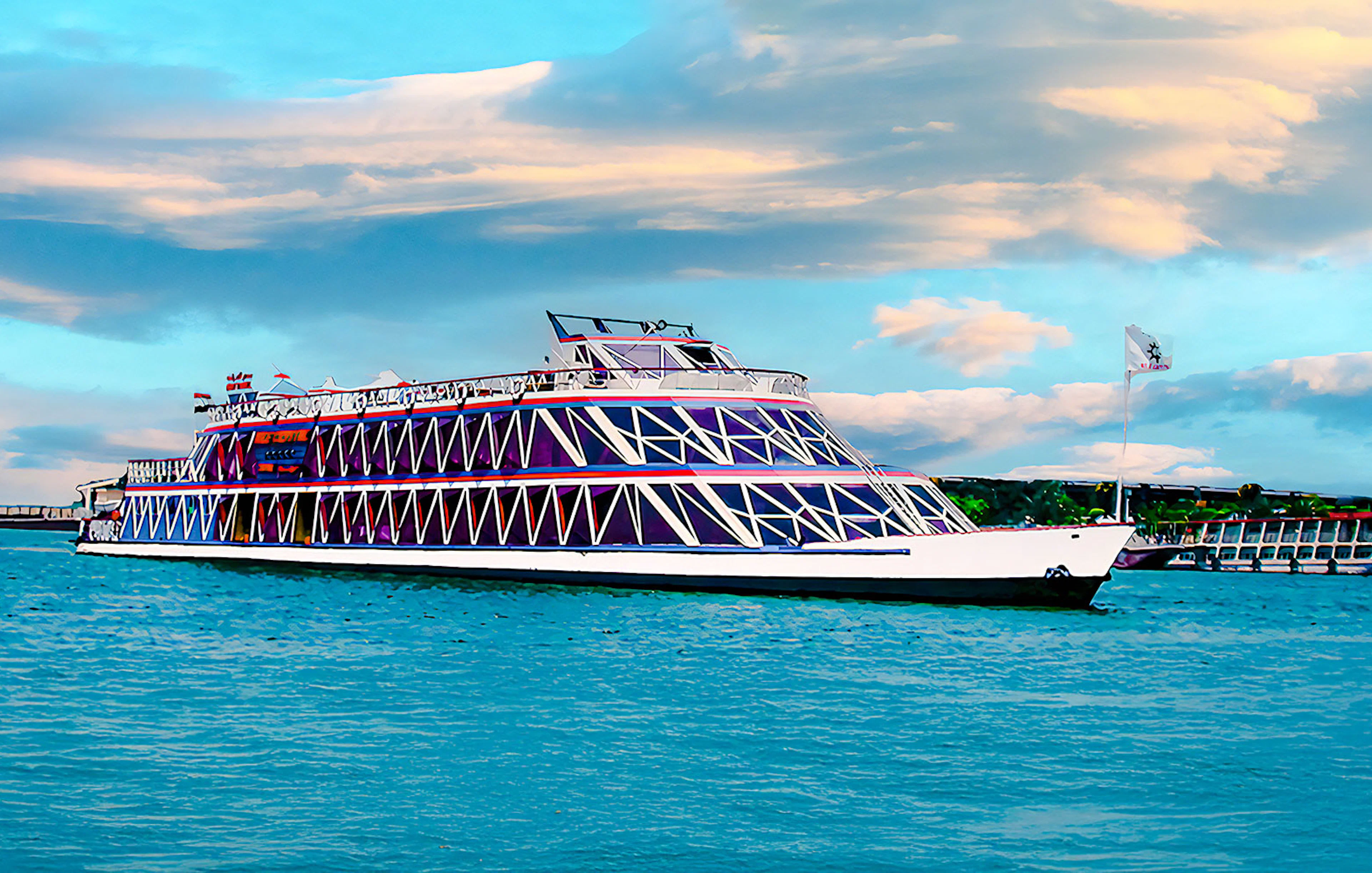 Nile cruise ship with geometric design on the river under a cloudy sky.