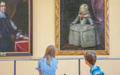 Children viewing portraits at Lobkowicz Palace Museum, Prague.