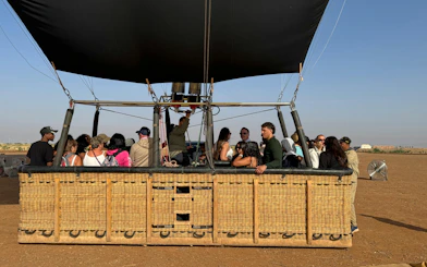 Tourists preparing for a hot air balloon flight over Marrakech.