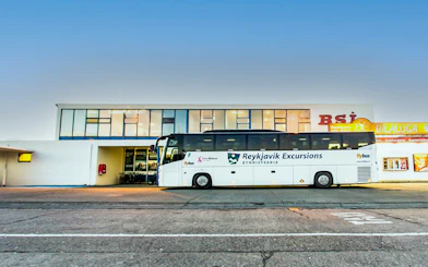 Reykjavik Excursions bus parked at BSI terminal for Keflavik Airport transfer.