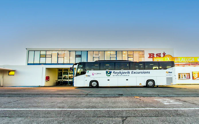 Reykjavik Excursions bus parked at BSI terminal for Keflavik Airport transfer.